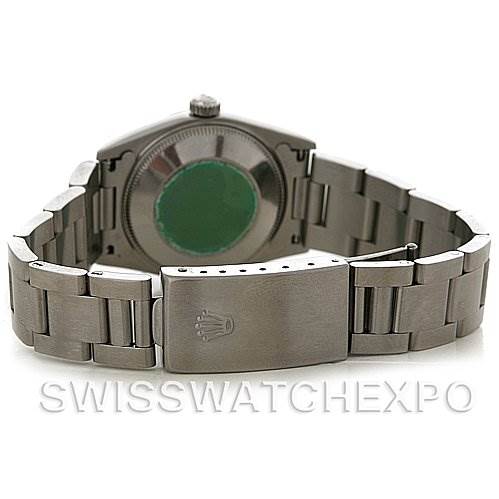 This image shows the back view of a Rolex Mid-Size 77014 Women's Stainless Steel Blue Dial 77014 Women's Stainless Steel Blue Dial model watch, featuring the bracelet, clasp, and case back.