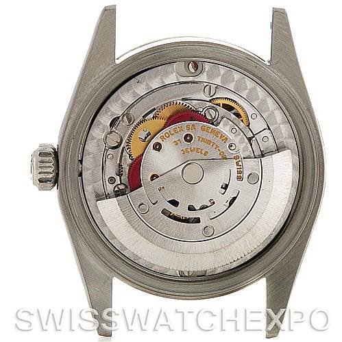 This is a rear view of the Rolex Mid-Size 77014 Women's Stainless Steel Blue Dial 77014 Women's Stainless Steel Blue Dial model showing the watch's internal movement and mechanisms.