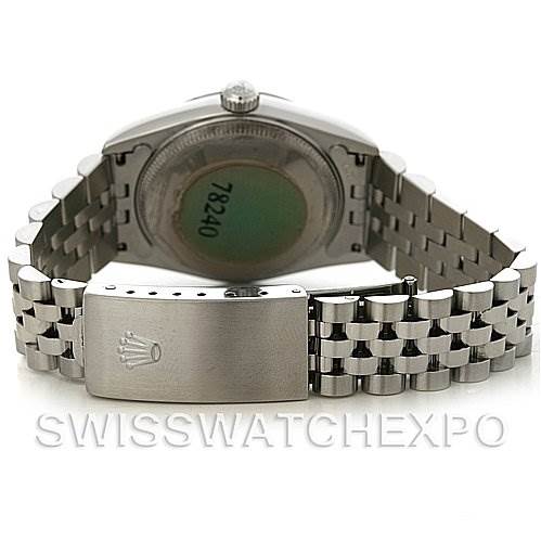 The image shows the back view of a Rolex Mid-Size 78240 Women's Stainless Steel White Dial 78240 Women's Stainless Steel White Dial watch, featuring its case back, bracelet, and clasp with the Rolex logo.