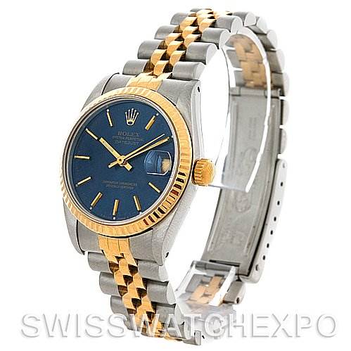 The image shows a Rolex Mid-Size 68273 Women
s Stainless Steel Blue Dial 68273 Women
s Stainless Steel Blue Dial watch at an angled view, highlighting the dial, bezel, crown, and partially open bracelet.