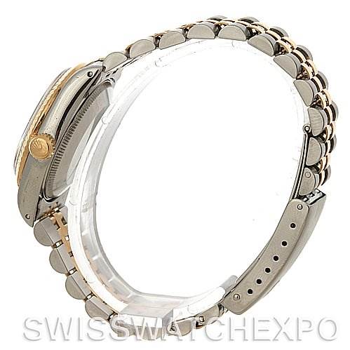 The image shows a side angle of the Rolex Mid-Size 68273 Women
s Stainless Steel Blue Dial 68273 Women
s Stainless Steel Blue Dial watch, highlighting its crown, bracelet, and clasp.