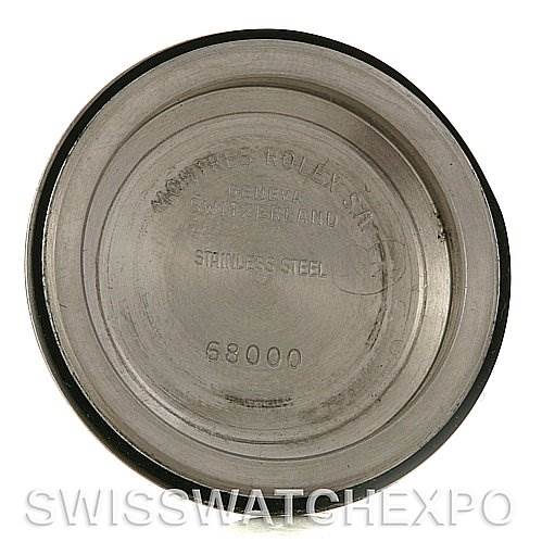 This image shows the interior case back of a Mid-Size Rolex watch, displaying markings and the model number 68000.