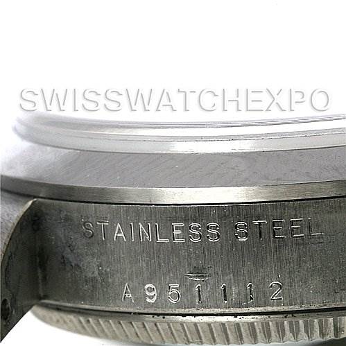 The image shows a close-up of the side of a Rolex Mid-Size 78240 Women's Stainless Steel Blue Dial 78240 Women's Stainless Steel Blue Dial model, highlighting the stainless steel material and serial number.