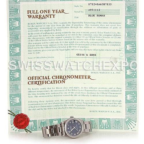 The image shows a Rolex Mid-Size 78240 Women's Stainless Steel Blue Dial 78240 Women's Stainless Steel Blue Dial watch with a blue roman dial, placed on its warranty and certification papers.