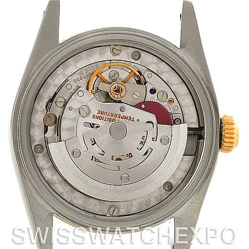 The image shows the inner mechanism of a Rolex Mid-Size 68273 Women's Stainless Steel White Dial 68273 Women's Stainless Steel White Dial watch from a rear angle with the case back removed.