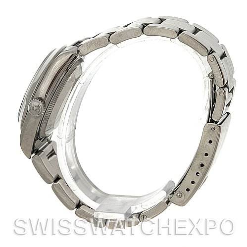 This image shows a side view of the Rolex Mid-Size 68240 Women's Stainless Steel Silver Dial 68240 Women's Stainless Steel Silver Dial model, highlighting the case, crown, and bracelet.