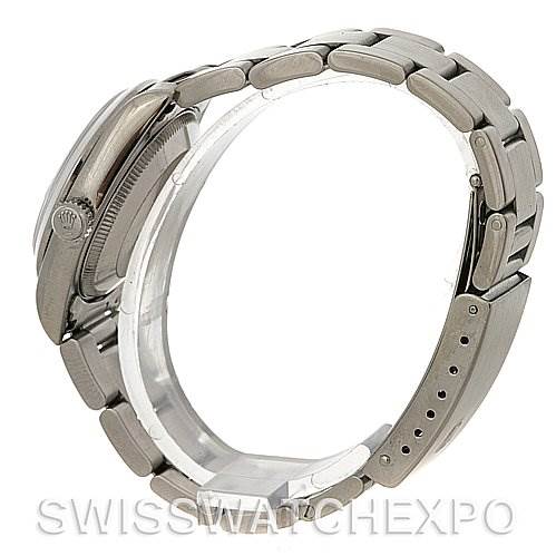 The image shows a side view of a Rolex Mid-Size 68240 Women's Stainless Steel Pink Dial 68240 Women's Stainless Steel Pink Dial model watch, focusing on the bracelet and clasp, with a clear view of the crown.