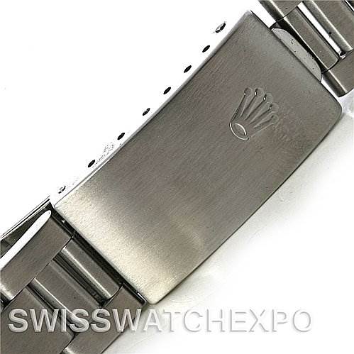 This image shows the clasp and part of the bracelet of a Rolex Mid-Size 68240 Women's Stainless Steel Pink Dial 68240 Women's Stainless Steel Pink Dial watch at a close-up angle.