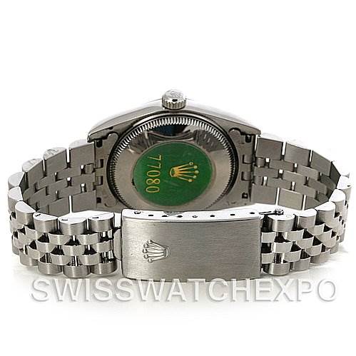 This image shows the back and bracelet of a mid-size Rolex watch, highlighting the clasp and case back.