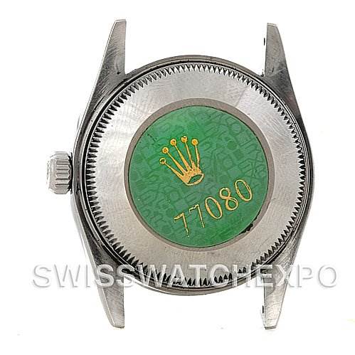 This image shows the case back of a mid-size Rolex model 77080 from a top-down angle.