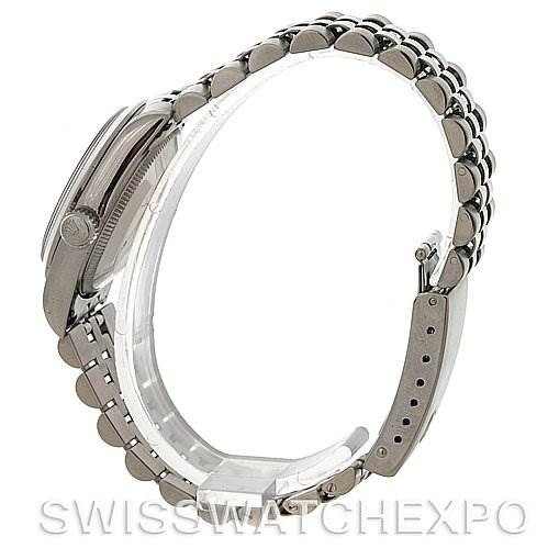 The image shows a side view of the Rolex Mid-Size 67480 Women's Stainless Steel Black Dial 67480 Women's Stainless Steel Black Dial watch, displaying its bracelet, case, and clasp.