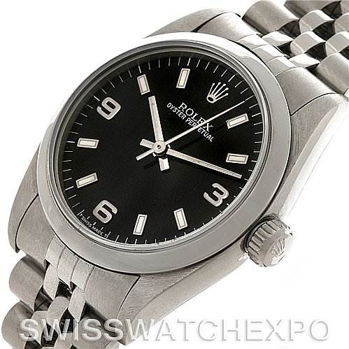 The image shows a mid-size Rolex Oyster Perpetual watch angled slightly from the front, displaying the dial, case, and part of the bracelet.