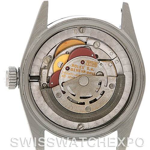 This image shows the internal mechanism and movement of a Rolex Mid-Size 67480 Women's Stainless Steel Black Dial 67480 Women's Stainless Steel Black Dial model watch, viewed from the back.