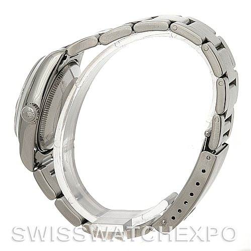 The image shows a side view of a mid-size Rolex watch, highlighting its stainless steel case, bracelet, and clasp.