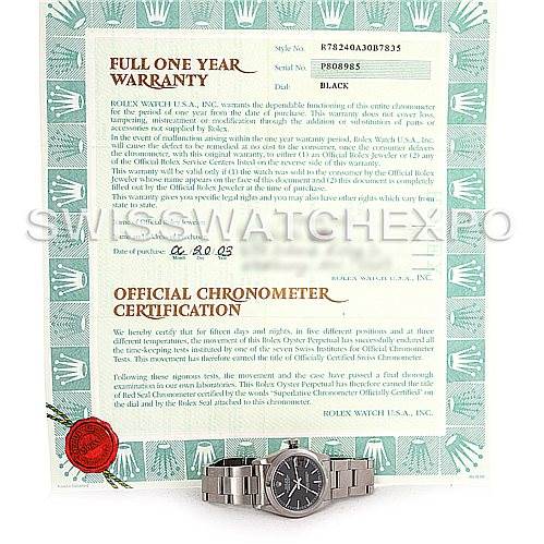 This image shows a Rolex Mid-Size 78240 Women's Stainless Steel Black Dial 78240 Women's Stainless Steel Black Dial watch with its black dial, along with its official chronometer certification and warranty document.
