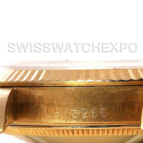 The image shows the side of a Rolex Mid-Size 68273 Women's Yellow Gold White Dial 68273 Women's Yellow Gold White Dial watch case, focusing on its reference number and part of the bezel.