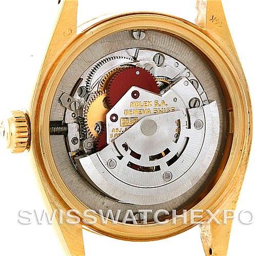 This image shows the inner mechanism of the Rolex Mid-Size 6827 Women's Yellow Gold Silver Dial 6827 Women's Yellow Gold Silver Dial watch, viewed from the back with the case back removed.