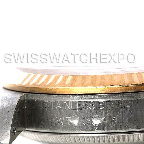 The image shows a close-up side view of a Rolex Datejust 68273 Women's Stainless Steel Blue Dial 68273 Women's Stainless Steel Blue Dial watch, focusing on the bezel and part of the stainless steel case.