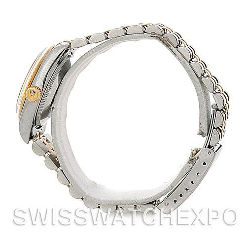 The image shows a side view of a Rolex Datejust 68273 Women's Stainless Steel Blue Dial 68273 Women's Stainless Steel Blue Dial model, highlighting the bracelet and the side of the watch case with the crown.