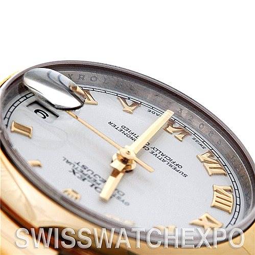 This image shows a close-up view of the Rolex Mid-Size 178243WRO Women's Stainless Steel White Dial 178243WRO Women's Stainless Steel White Dial model watch dial, hands, and part of the bezel with Roman numeral hour markers.