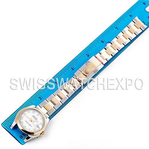 The image shows a Rolex Mid-Size 178243WRO Women's Stainless Steel White Dial 178243WRO Women's Stainless Steel White Dial watch laid flat against a blue ruler, displaying the watch face, bracelet, and clasp.