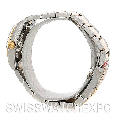 This image shows a side view of the band and bezel of a Mid-Size Rolex watch.