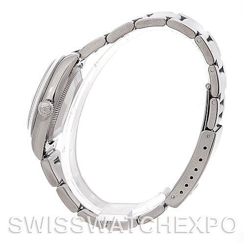 The image shows a side view of a Rolex Mid-Size 78240 Women's Stainless Steel White Dial 78240 Women's Stainless Steel White Dial model watch displaying its case, crown, and bracelet.