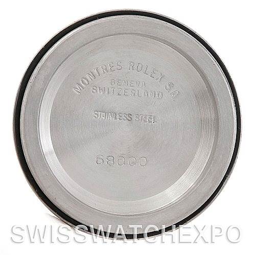 This image shows the back case of a Mid-Size Rolex watch, viewed directly from above.