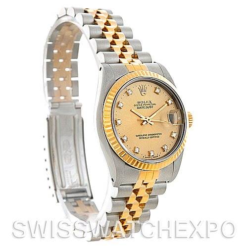This image shows a Rolex Mid-Size 68273 Women's Stainless Steel Champagne Dial 68273 Women's Stainless Steel Champagne Dial Datejust watch at an angle, highlighting the face, bezel, and two-tone bracelet.
