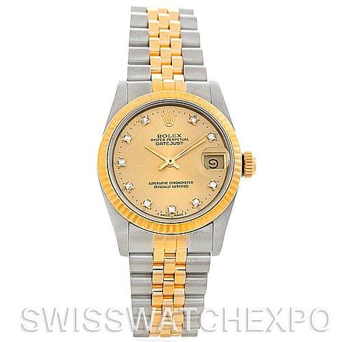 The image shows a front view of a mid-size Rolex Datejust, featuring a two-tone metal bracelet and diamond hour markers.
