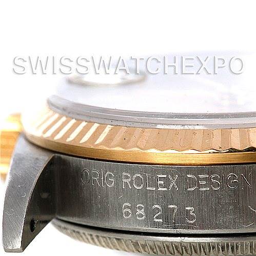 The image shows a close-up of the side of a Mid-Size Rolex watch, displaying its engraved model number.