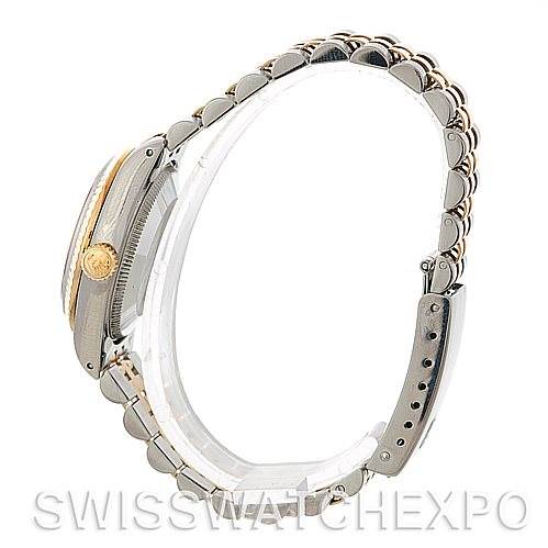 The image shows a side profile of a Rolex Mid-Size 68273 Women's Stainless Steel Champagne Dial 68273 Women's Stainless Steel Champagne Dial watch, focusing on the case and bracelet.