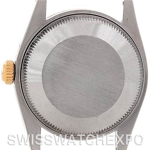 The image shows the back case and crown of a Rolex Mid-Size 68273 Women's Stainless Steel Champagne Dial 68273 Women's Stainless Steel Champagne Dial model watch.