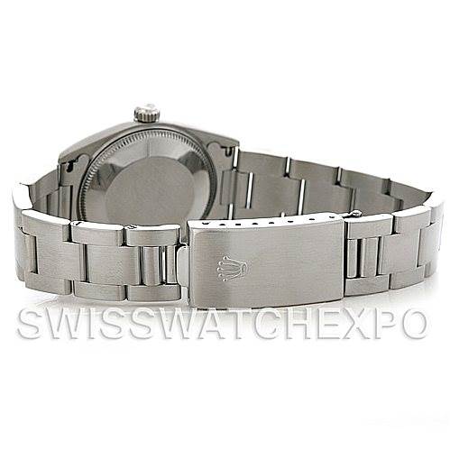 The image shows the backside and clasp of a Rolex Mid-Size 67514 Women's Stainless Steel Blue Dial 67514 Women's Stainless Steel Blue Dial model watch.