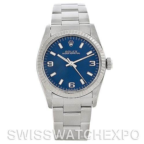 This image shows a front view of the Mid-Size Rolex Oyster Perpetual watch, displaying its blue dial, silver bracelet, and crown.
