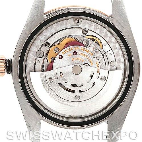 The image shows the movement mechanism of a Rolex Mid-Size 178271 Women's Steel and Gold (two tone) Blue Dial 178271 Women's Steel and Gold (two tone) Blue Dial model watch from the rear.