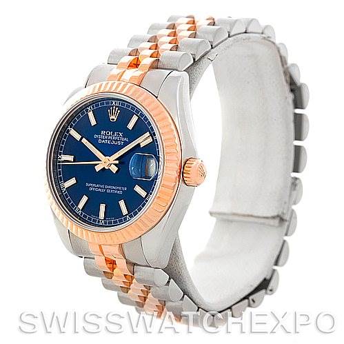 The image shows a Rolex Datejust Mid-Size watch at a slight angle, featuring a blue dial, two-tone bezel, and Jubilee bracelet.