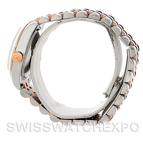 This image shows a side view of a Rolex Mid-Size 178271 Women's Steel and Gold (two tone) Blue Dial 178271 Women's Steel and Gold (two tone) Blue Dial model watch, displaying the crown, bezel, and bracelet.