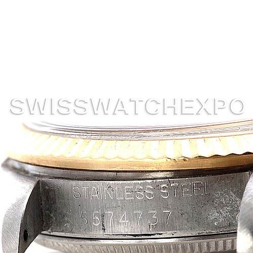 This image shows a close-up of the side profile of a Mid-Size Rolex watch, focusing on its stainless steel case and part of the bezel.
