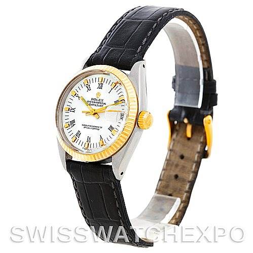This image shows a Rolex Mid-Size 6827 Women's Stainless Steel White Dial 6827 Women's Stainless Steel White Dial watch at a three-quarter angle, highlighting its gold bezel, white dial, and black leather strap.