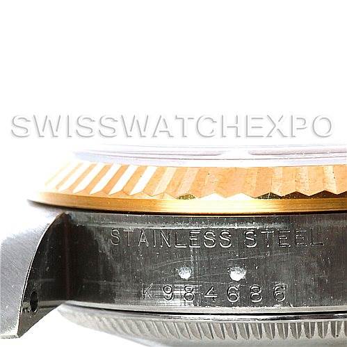 The image shows a close-up side view of a Mid-Size Rolex watch, highlighting the stainless steel case and the serial number.