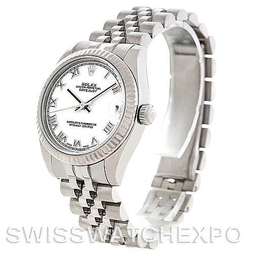 The image shows a side-angle view of a Rolex Mid-Size 178274 Women
s Stainless Steel White Dial 178274 Women
s Stainless Steel White Dial watch, displaying the face, bezel, and part of the bracelet.