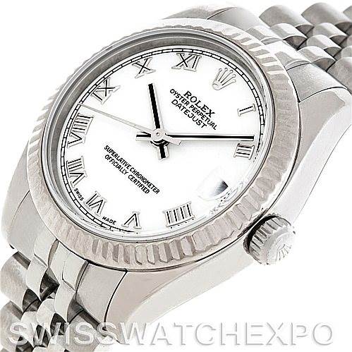 This image shows a Rolex Mid-Size 178274 Women
s Stainless Steel White Dial 178274 Women
s Stainless Steel White Dial Oyster Perpetual Datejust model from an angled front-left view, highlighting the face, bezel, crown, and part of the bracelet.