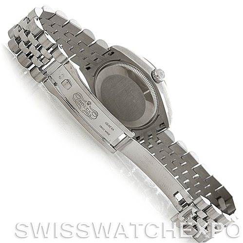 The image shows the back case and bracelet of a Mid-Size Rolex watch, viewed from the underside.