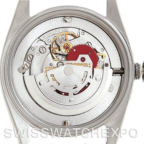 The image shows the internal mechanism of a Rolex Mid-Size 6824 Women's Stainless Steel Black Dial 6824 Women's Stainless Steel Black Dial watch, viewed from the back with the case back removed.