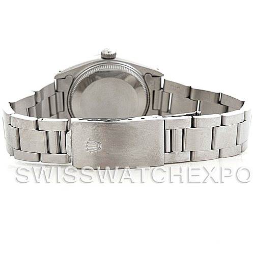 This image shows the back view of a mid-size Rolex watch, highlighting the caseback, bracelet, and clasp.