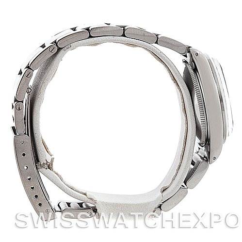 This image shows a side profile of a Rolex Mid-Size 6824 Women's Stainless Steel Black Dial 6824 Women's Stainless Steel Black Dial model watch, highlighting its bracelet and case.