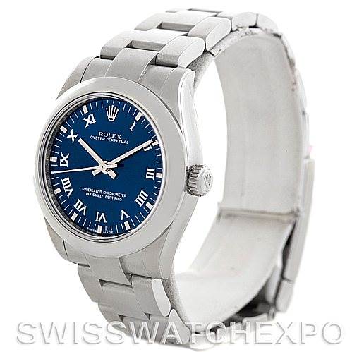 This Rolex Oyster Perpetual Mid-Size watch is shown at a three-quarter angle, displaying the blue dial, bracelet, and crown.