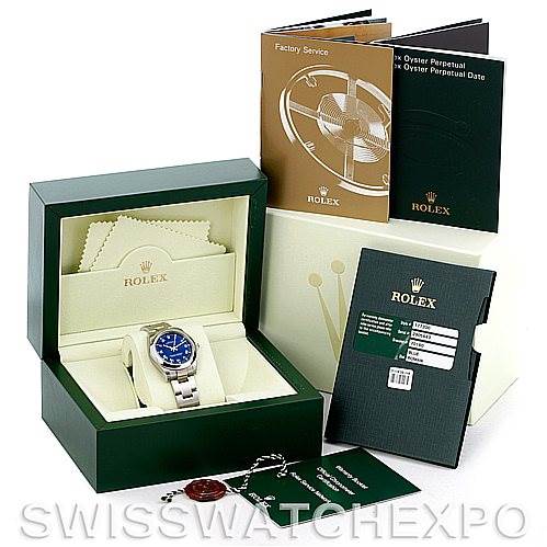 This image shows a Rolex Mid-Size 177200 Women's Stainless Steel Blue Dial 177200 Women's Stainless Steel Blue Dial watch with a blue dial in its box, along with manuals, tags, a cleaning cloth, and warranty cards.