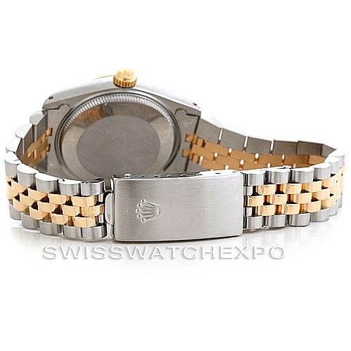 This Rolex Mid-Size 68273 Women's Stainless Steel Champagne Dial 68273 Women's Stainless Steel Champagne Dial model is shown from the back, displaying the clasp, bracelet, and case back.